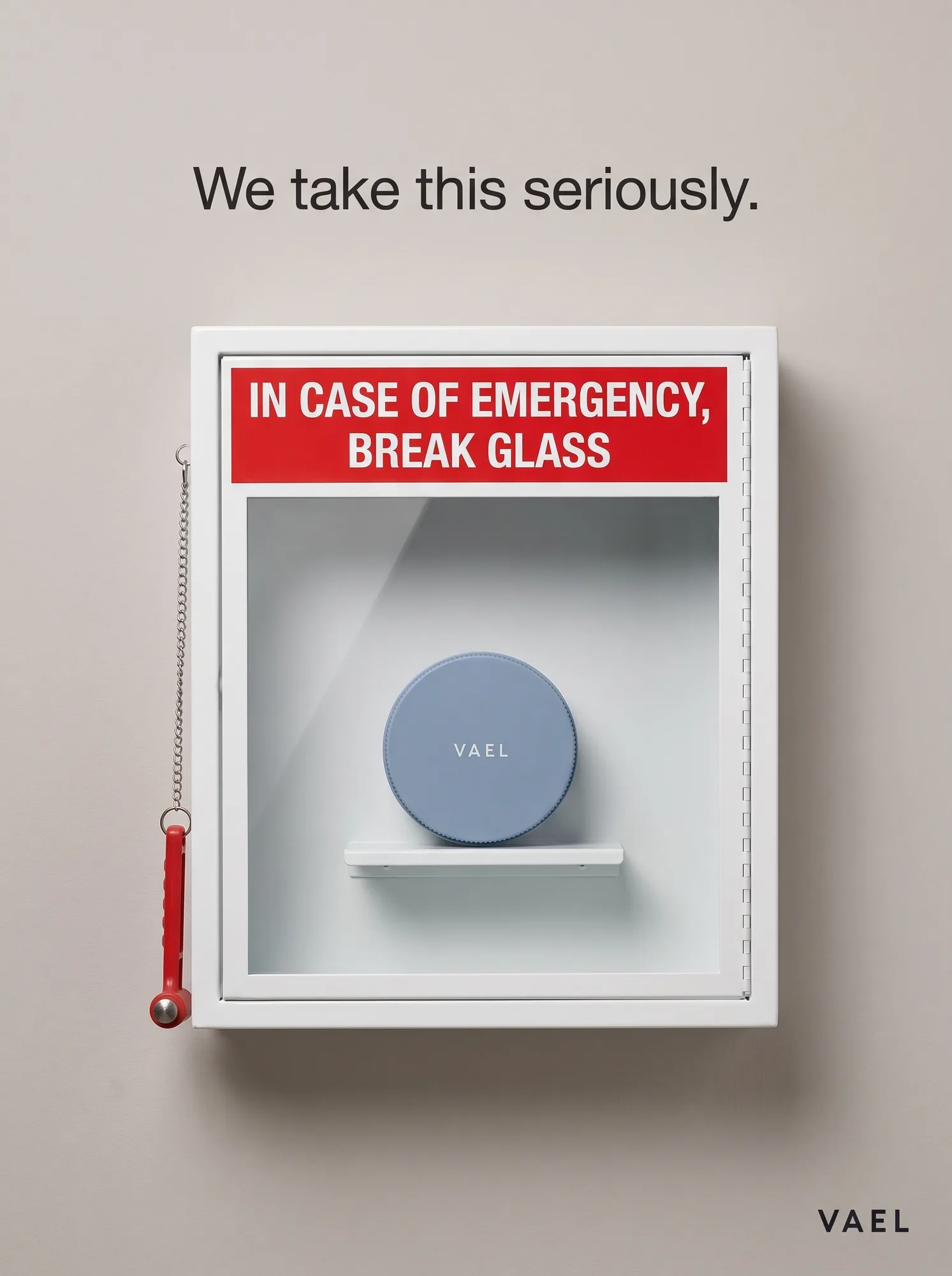 Vael pimple patch campaign — an emergency break-glass box protecting a small blue tin, 'We take this seriously.'